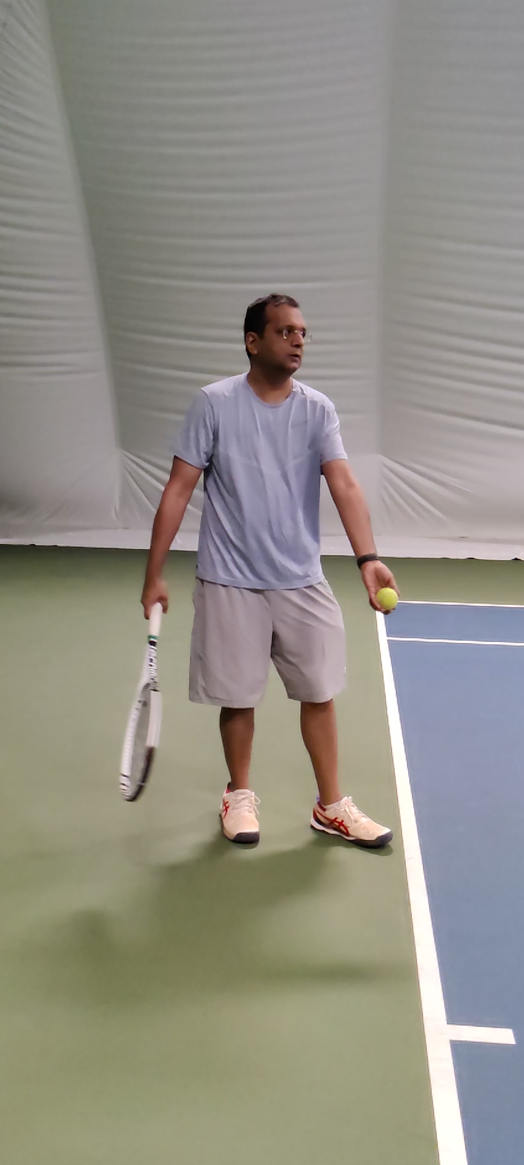 Adult Playing Tennis